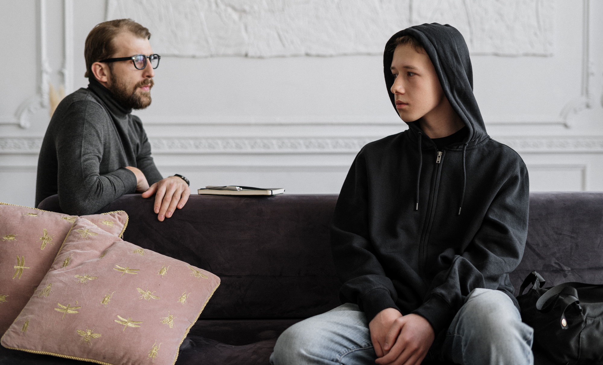 Father and son, serious conversation, son is having trouble, father is trying to help his son. Parent is trying to help a child to break a bad habit. How to help a child to break a bad habit?